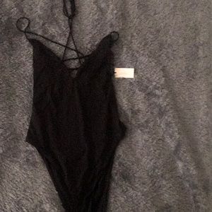 Blk bathing suit, very sexy. Low & Crisscross back